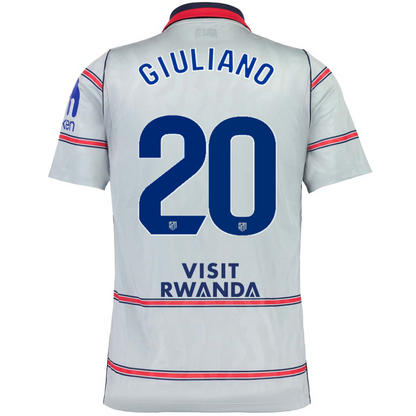 Back view of a light gray soccer jersey with blue and red trim, featuring the name GIULIANO and number 20 on the back, with 'VISIT RWANDA' printed below.
