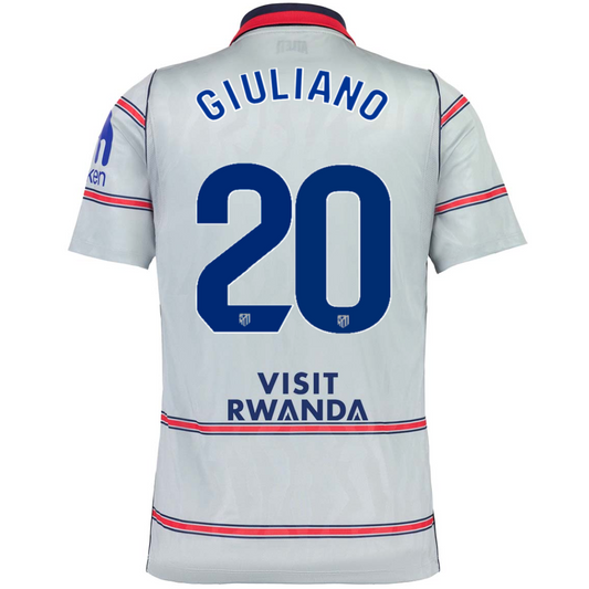 Back view of a light gray soccer jersey with blue and red trim, featuring the name GIULIANO and number 20 on the back, with 'VISIT RWANDA' printed below.