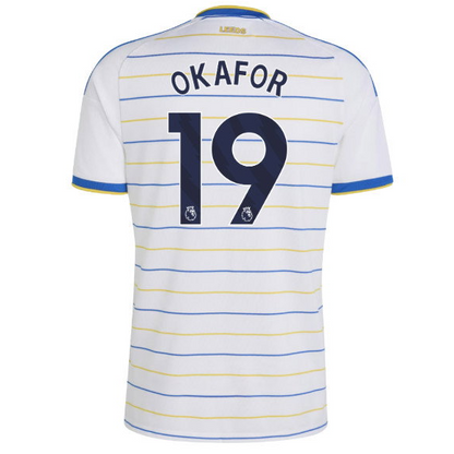 White Leeds United football jersey with blue and yellow horizontal stripes, featuring 'OKAFOR' and the number '19' printed on the back.