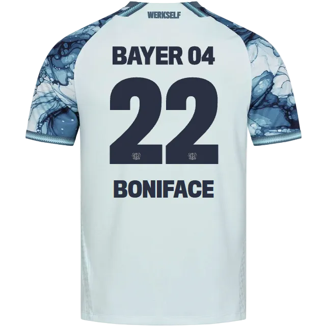 Back view of a light blue soccer jersey with dark navy text reading 'BAYER 04', the number '22', and 'BONIFACE' on the back, plus blue abstract shoulder patterns and 'WERKSELF' at the collar.